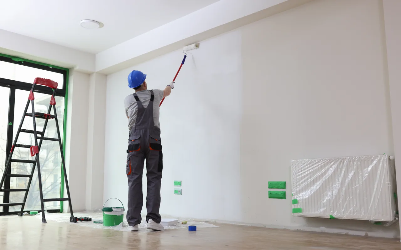 Painting production rates showing how much surface area is painted per hour by brush, roller and spray.